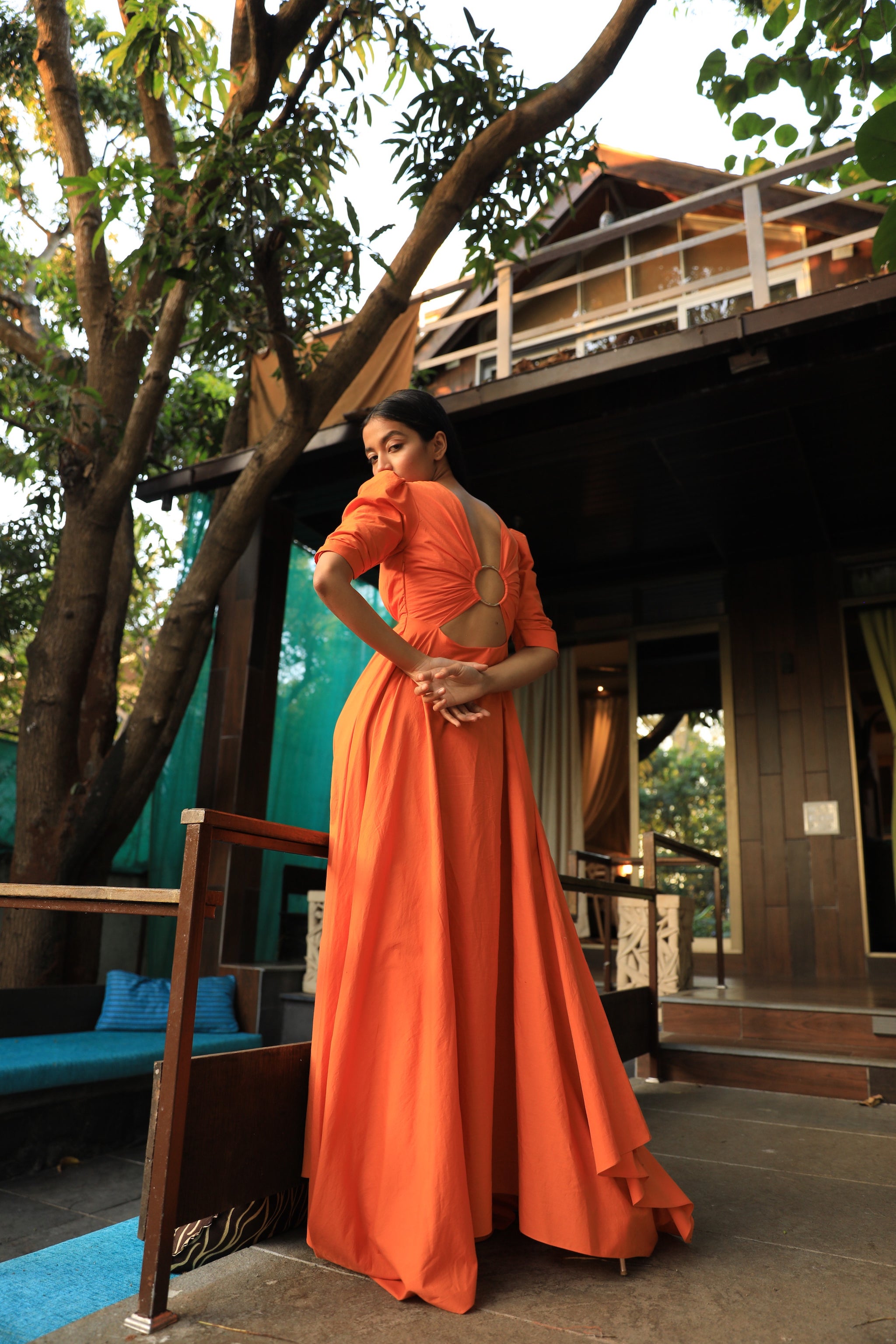 orange colour one piece dress Orange dress with a plunging draped neckline and cut out back Zwaan